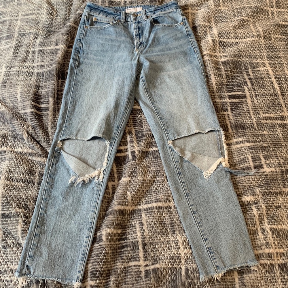 Blue ripped mom jeans